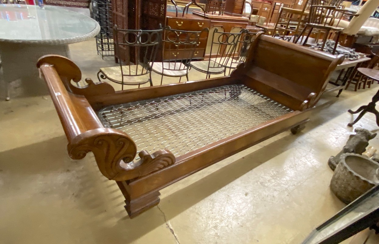 A 19th century Continental carved mahogany single sleigh bed, width 109cm, length 260cm, height 94cm
